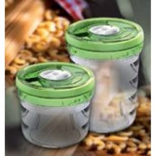 Цилиндрическая емкость VacSy зеленая.